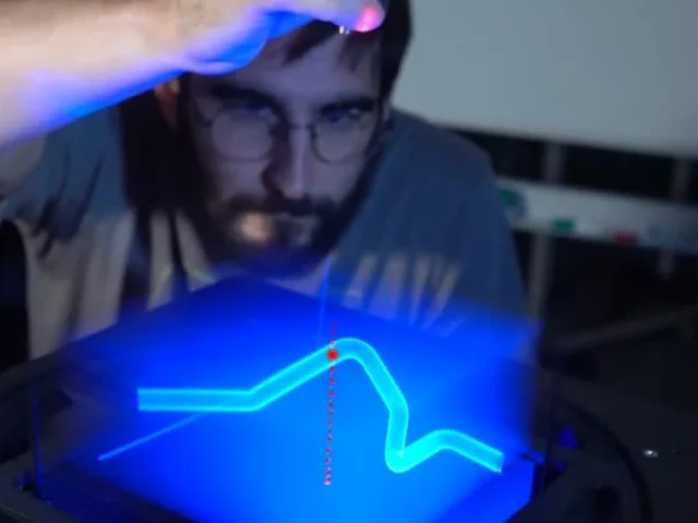 PointerVol: A Laser Pointer for Swept Volumetric Displays